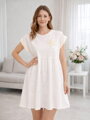 Dámske áčkové šaty v bielej farbe