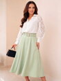 Dámska elegantná midi pistáciová sukňa 