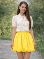 Dámska puffová žltá sukňa 